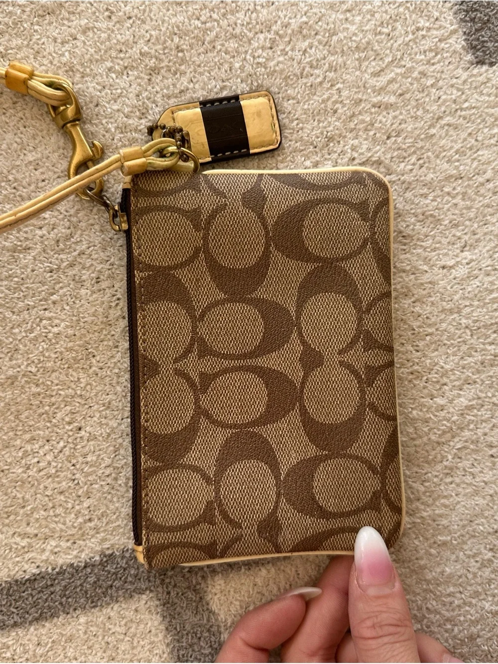 Coach Brown and Cream Signature Zip Wristlet with Gold Hardware